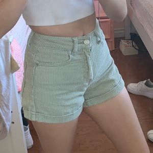green corduroy shorts